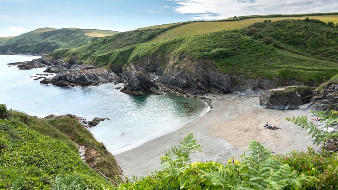 view down onto Lansallos beach in Cornwall